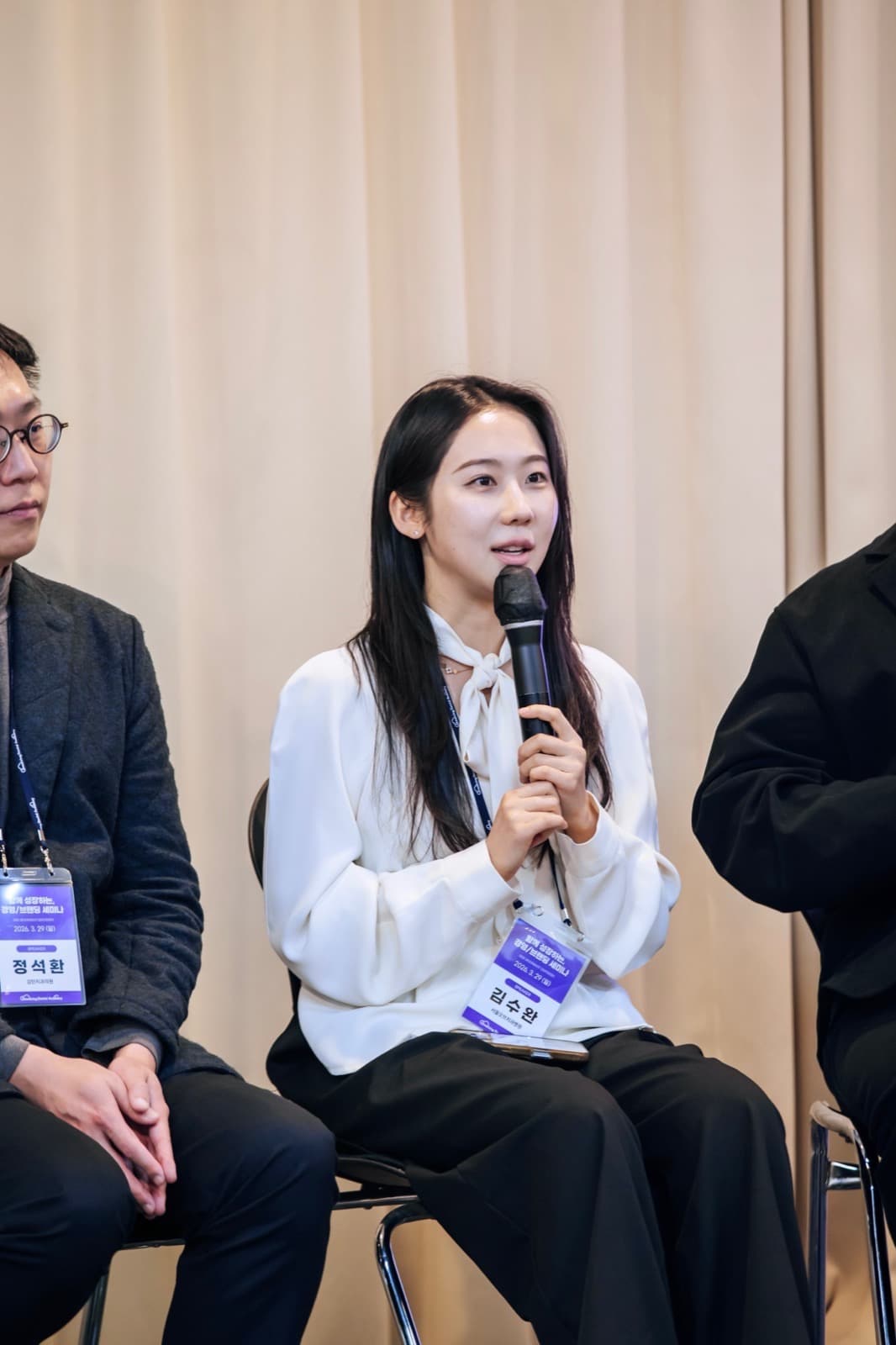 Dr. Kim Suwan on a dental seminar panel discussion